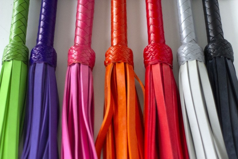 Neoprene floggers are also available in Daddy green, anything goes orange and fisting red!