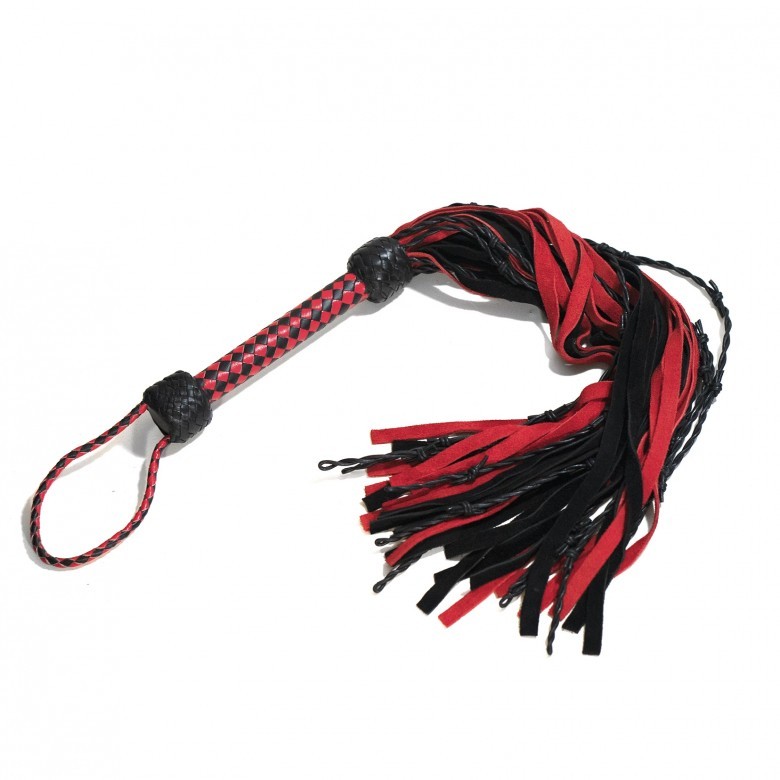 "Barbed Wire" flogger from The Dungeon store. Has leather braids with barbed knots.